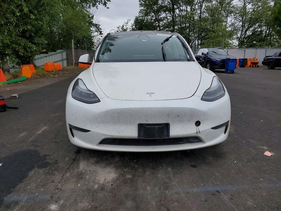 2023 Tesla Model y VIN 7SAYGDEE3PF909035 COPART salvage auction — SIDE, Or - Salvage Title Certificate, sold $8,000 on 2026-07-08 (photo 5)