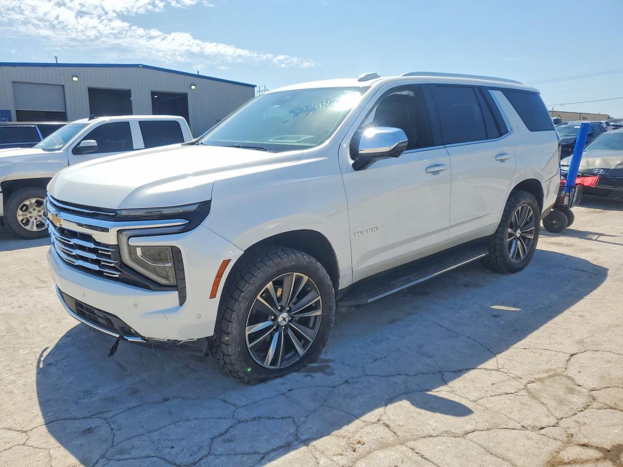 2025 Chevrolet Tahoe VIN 1GNS6SR82SR246680 COPART salvage auction — Side, OK - CERT OF TITLE-SALVAGE, sold $37,500 on 2026-06-30 (photo 1)