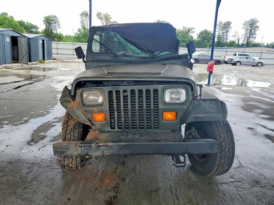 1995 Jeep Wrangler / VIN 1J4FY19P3SP313282 COPART salvage auction — ROLLOVER, GA - CERT OF TITLE-SALVAGE, sold $400 on 2026-07-02 (photo 5)