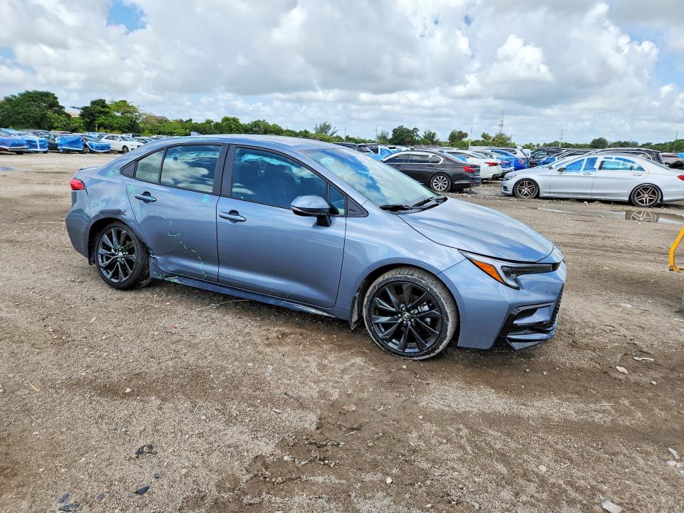 2026 Toyota Corolla VIN 5YFS4MCEXTP275834 COPART salvage auction — SIDE, Fl - Cert Of Title Slvg Rebuildable, sold $13,000 on 2026-07-07 (photo 4)