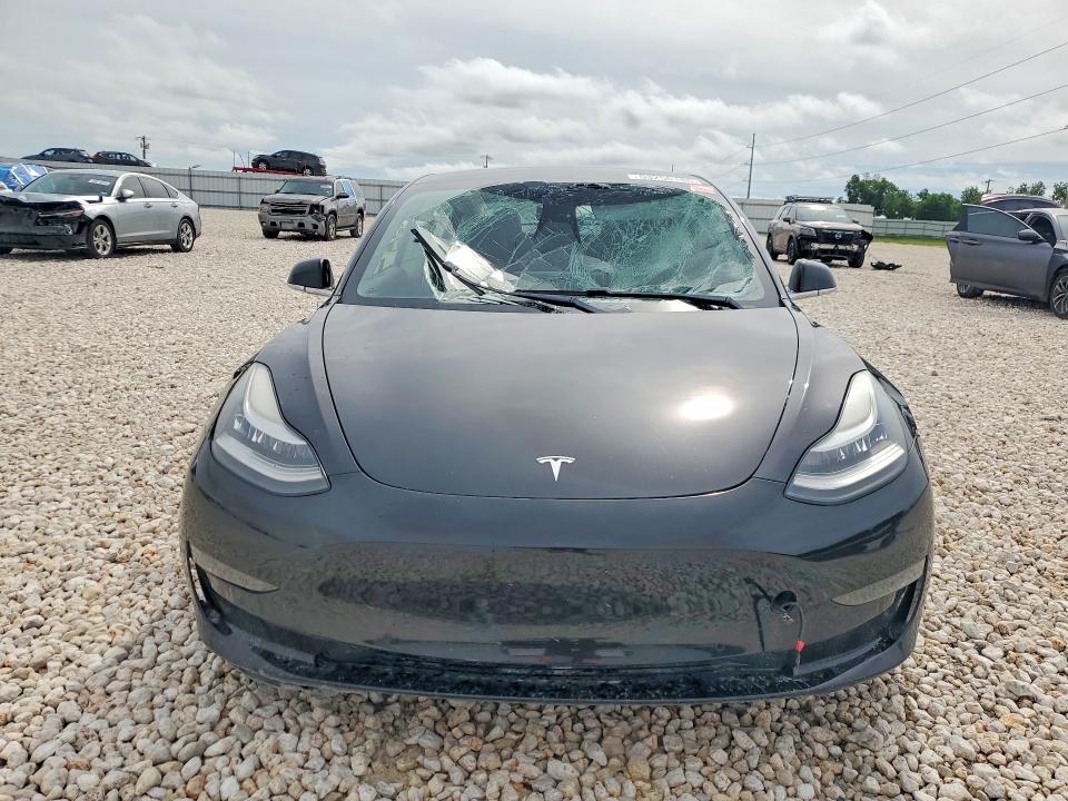 2019 Tesla Model 3 VIN 5YJ3E1EB2KF384205 COPART salvage auction — SIDE, Tx - Salvage Vehicle Title, sold $3,400 on 2026-07-09 (photo 5)