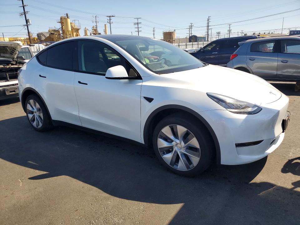 2023 Tesla Model y VIN 7SAYGDEE5PA149347 COPART salvage auction — REAR END, Ca - Salvage Certificate, sold $14,100 on 2026-07-06 (photo 4)
