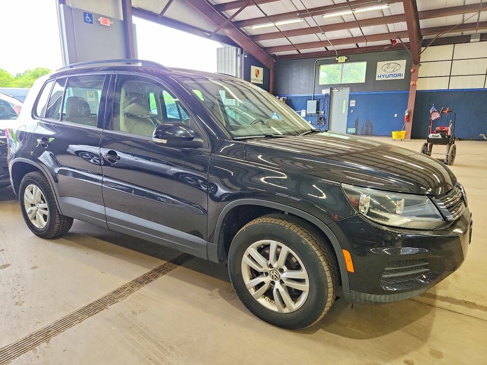 2017 Volkswagen Tiguan VIN WVGBV7AXXHK000324 COPART salvage auction — MINOR DENT/SCRATCHES, Va - Certificate Of Title, sold $4,100 on 2026-07-27 (photo 4)