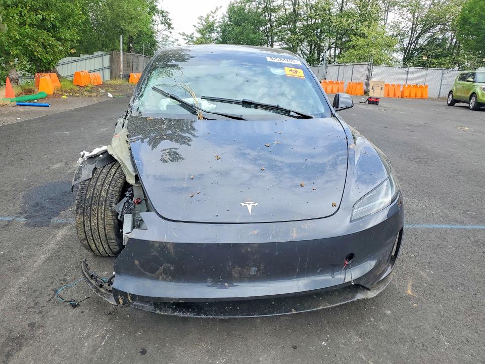 2025 Tesla VIN 5YJ3E1ET4SF003088 COPART salvage auction — FRONT END, Or - Salvage Title Certificate, sold $14,200 on 2026-07-15 (photo 5)