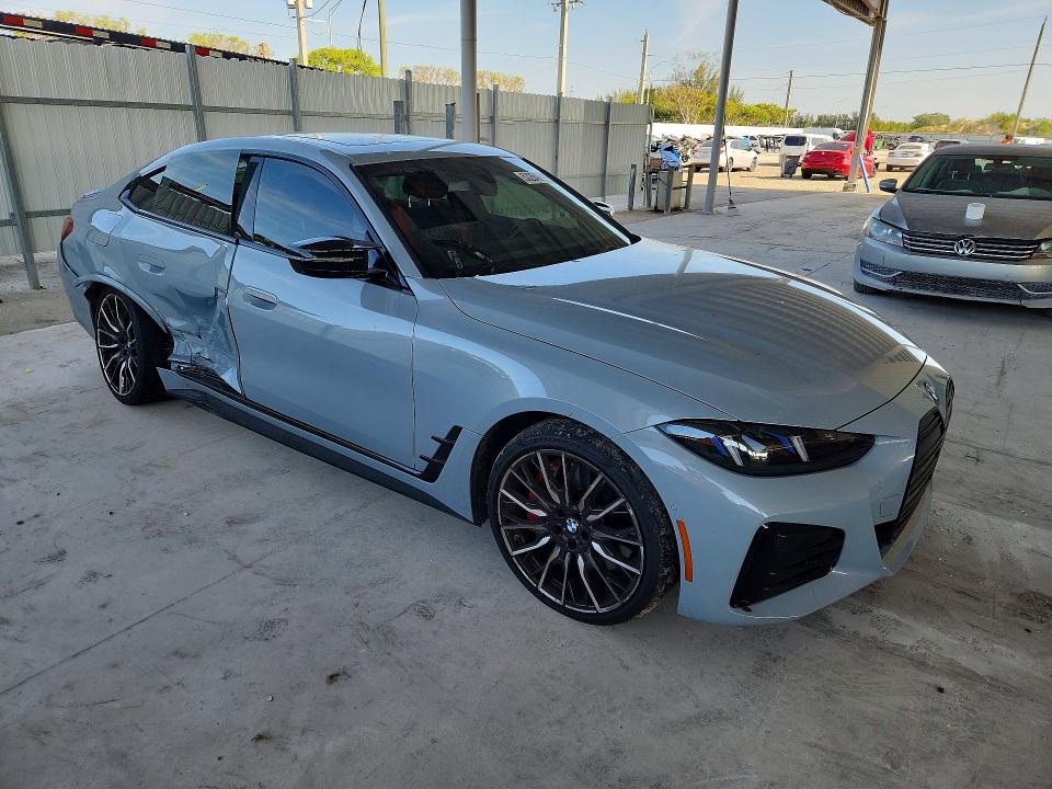 2025 BMW I4 VIN WBY33HD06SFT96110 COPART salvage auction — SIDE, Fl - Cert Of Title Slvg Rebuildable, sold $21,300 on 2026-07-22 (photo 4)