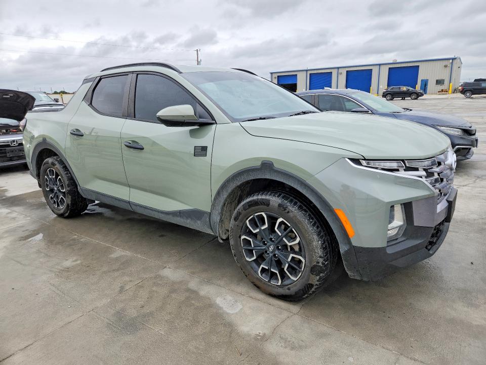 2022 Hyundai Santa cruz VIN 5NTJCDAE7NH030167 COPART salvage auction — HAIL, Tx - Certificate Of Title, sold $11,400 on 2026-07-14 (photo 4)