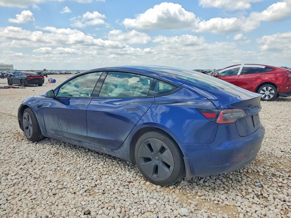 2021 Tesla Model 3 VIN 5YJ3E1EB8MF961001 COPART salvage auction — SIDE, Tx - Salvage Vehicle Title, sold $2,550 on 2026-07-23 (photo 2)