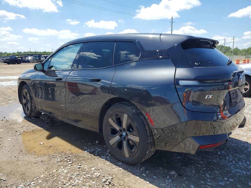 2025 BMW Ix VIN WB523CF05SCT45837 COPART salvage auction — SIDE, TX - SALVAGE VEHICLE TITLE, sold $28,500 on 2026-08-03 (photo 2)