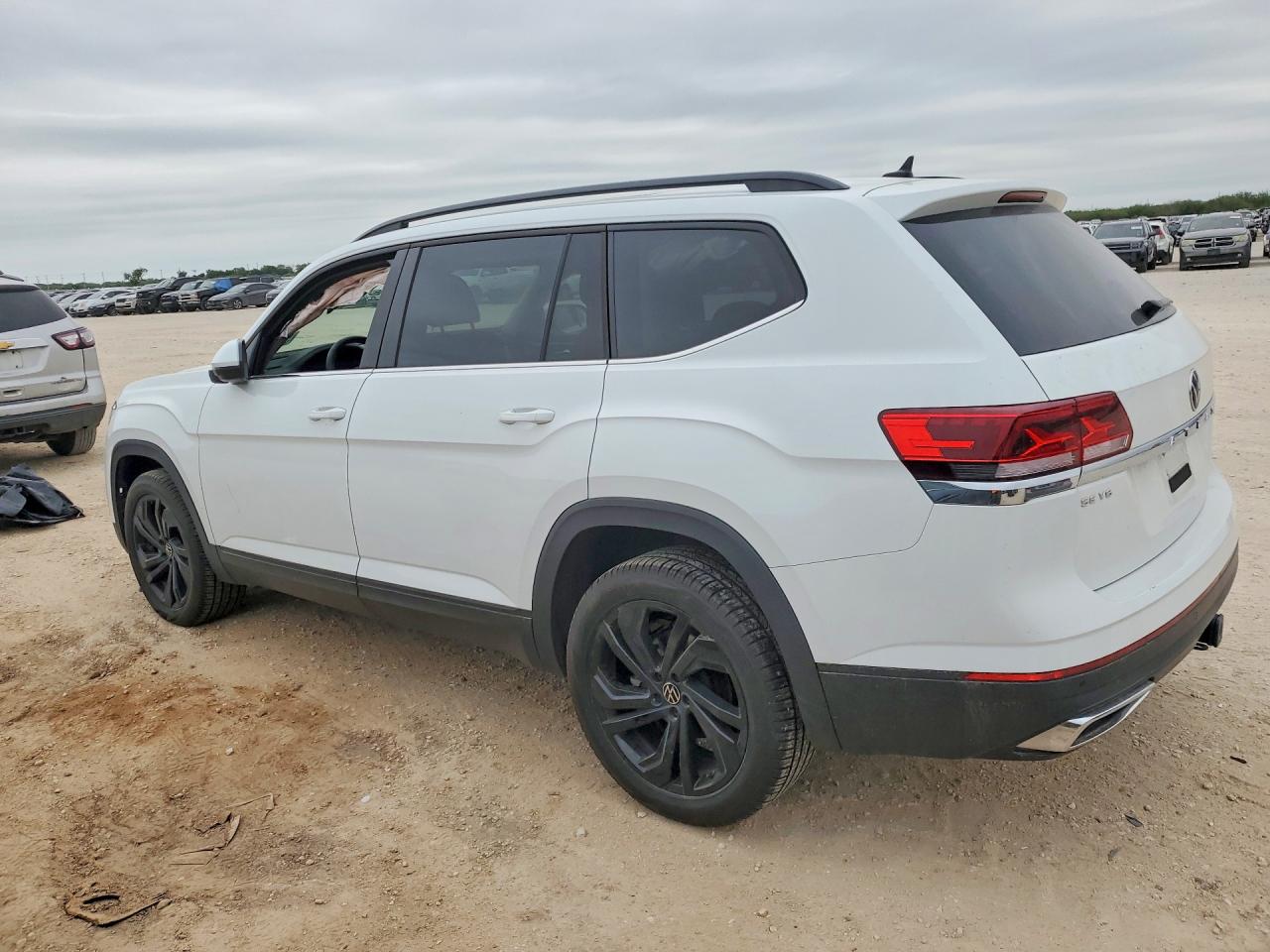 2023 Volkswagen Atlas VIN 1V2KR2CA9PC551517 COPART salvage auction — Side, TX - SALVAGE VEHICLE TITLE, sold $9,600 on 2026-07-09 (photo 2)