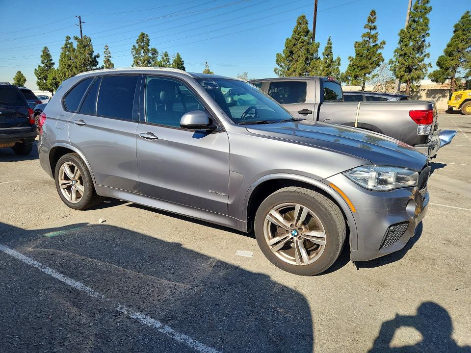 2014 BMW X5 VIN 5UXKR2C52E0H32480 COPART salvage auction — MINOR DENT/SCRATCHES, Ca - Dis/Dlr/Exp Only Clean Title, sold $2,500 on 2026-07-02 (photo 4)