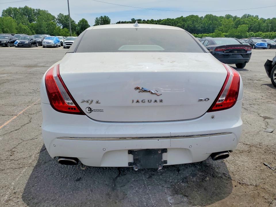 2013 Jaguar VIN SAJWA2G10DLV53383 COPART salvage auction — SIDE, Ky - Certificate Of Title, sold $575 on 2026-07-20 (photo 6)