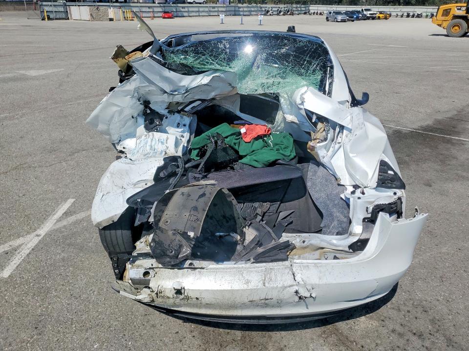 2023 Tesla Model 3 VIN 5YJ3E1EA0PF665515 COPART salvage auction — ALL OVER, CA - SALVAGE CERTIFICATE, sold $4,150 on 2026-07-16 (photo 6)