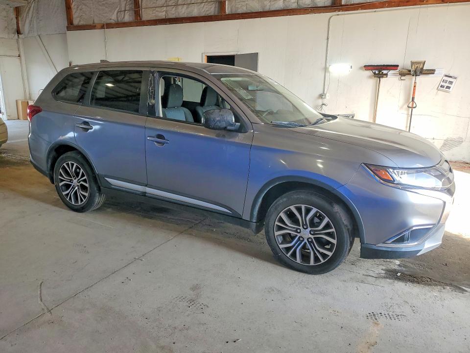 2018 Mitsubishi VIN JA4AD2A31JJ002794 COPART salvage auction — MINOR DENT/SCRATCHES, Tn - Certificate Of Title, sold $3,800 on 2026-07-08 (photo 4)