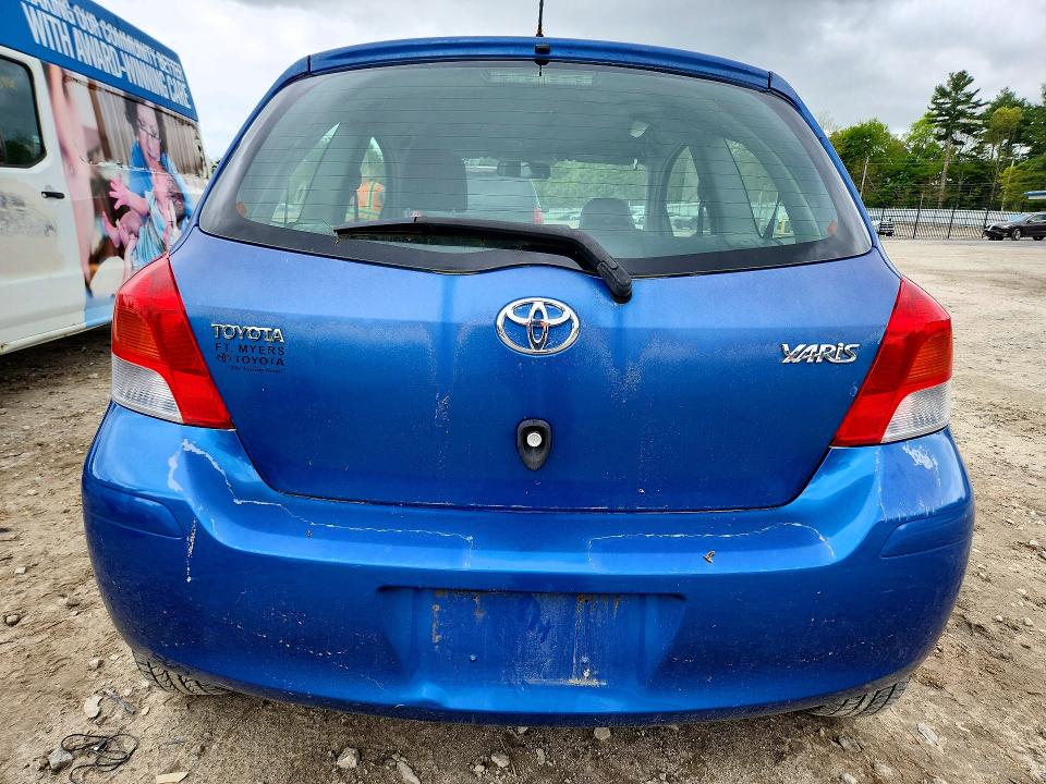 2010 Toyota Yaris VIN JTDJT4K38A5289353 COPART salvage auction — SIDE, Ma - Cert Of Title-Reconstrctd Coll, sold $1,550 on 2026-07-02 (photo 6)