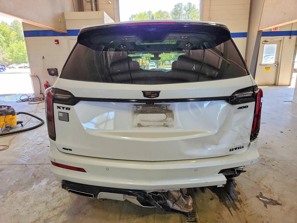 2021 Cadillac Xt6 VIN 1GYKPGRS5MZ170755 COPART salvage auction — REAR END, Tx - Salvage Vehicle Title, sold $8,400 on 2026-09-03 (photo 6)