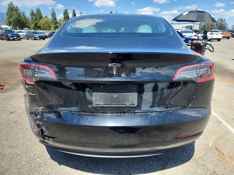 2023 Tesla Model 3 VIN 5YJ3E1EAXPF581783 COPART salvage auction — REAR END, CA - SALVAGE CERTIFICATE, sold $8,200 on 2026-07-21 (photo 6)
