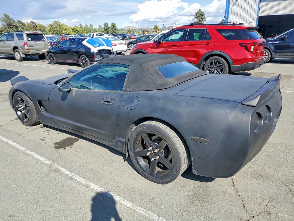 2002 Chevrolet Corvette VIN 1G1YY32G825115600 COPART salvage auction — MINOR DENT/SCRATCHES, Fl - Dis/Dlr/Exp Only Clean Title, sold $2,300 on 2026-07-31 (photo 2)