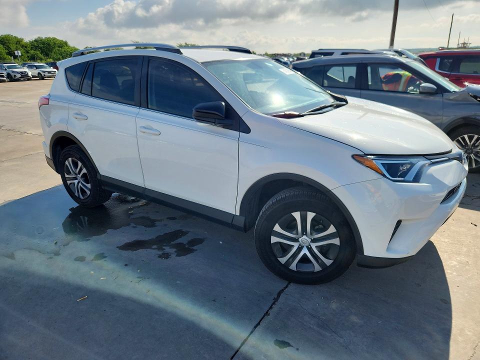 2016 Toyota VIN JTMZFREV3GJ084446 COPART salvage auction — SIDE, Tx - Salvage Vehicle Title, sold $5,900 on 2026-07-16 (photo 4)