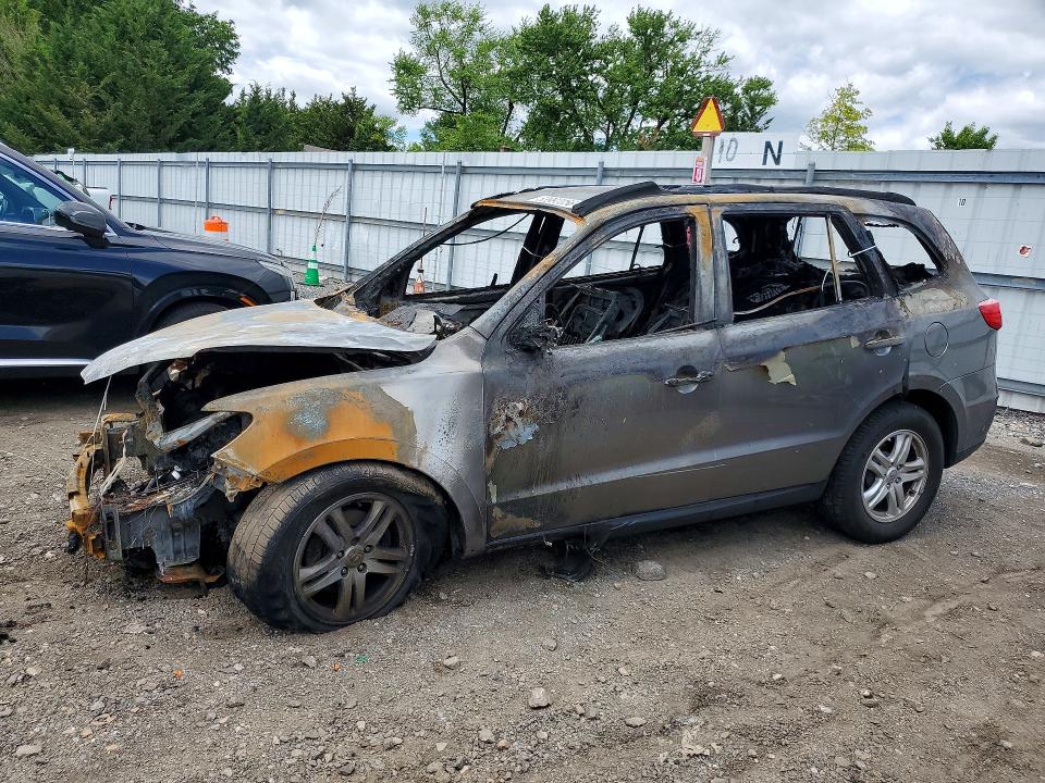 2011 Hyundai Santa fe VIN 5XYZG3AB4BG024075 COPART salvage auction — BURN, Md - Cert Of Salvage > 75% Damage, sold $250 on 2026-07-13 (photo 1)