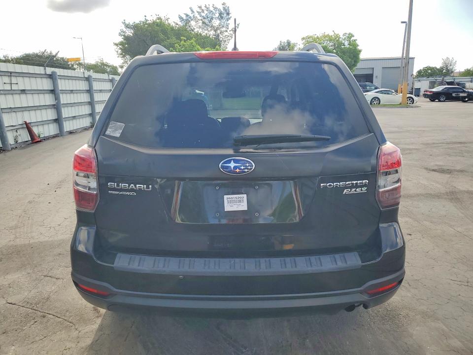 2014 Subaru Forester VIN JF2SJAEC8EH467868 COPART salvage auction — MINOR DENT/SCRATCHES, FL - CERTIFICATE OF TITLE, sold $975 on 2026-07-27 (photo 6)