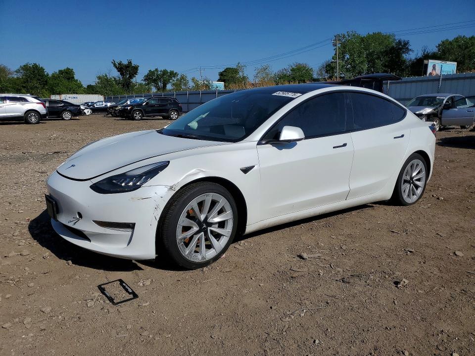 2021 Tesla Model 3 VIN 5YJ3E1EB4MF862501 — COPART salvage auction photo