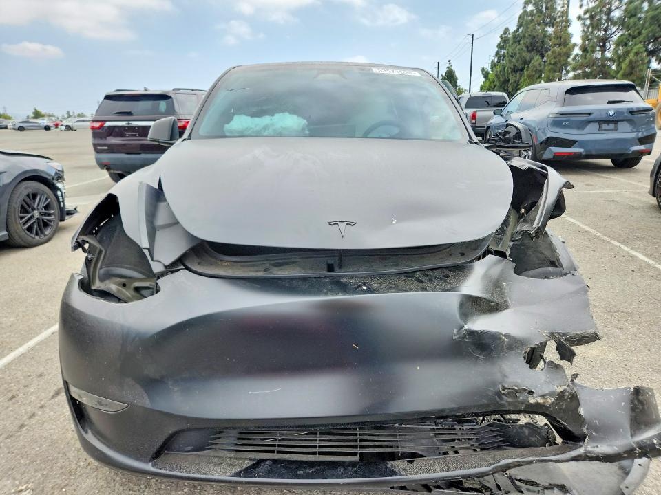 2024 Tesla Model y VIN 7SAYGDEF0RA326320 COPART salvage auction — FRONT END, Ca - Salvage Certificate, sold $7,400 on 2026-07-07 (photo 5)