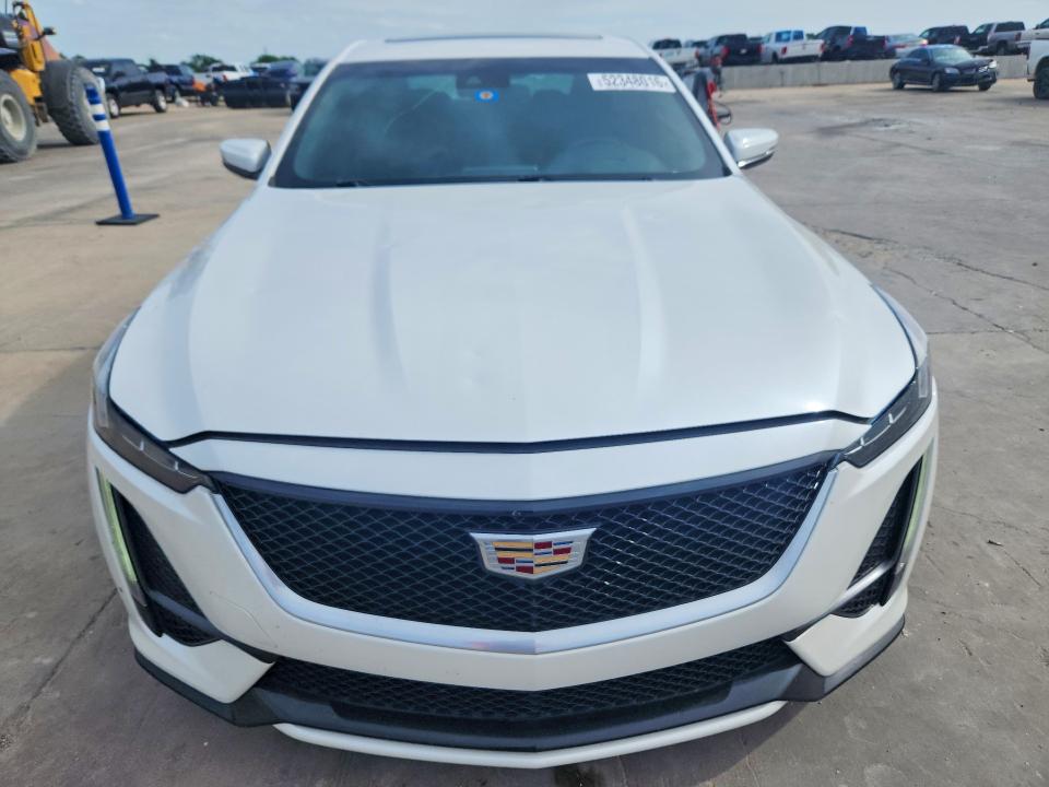 2021 Cadillac Ct5 VIN 1G6DP5RK0M0124888 COPART salvage auction — HAIL, Tx - Certificate Of Title, sold $13,600 on 2026-08-03 (photo 5)