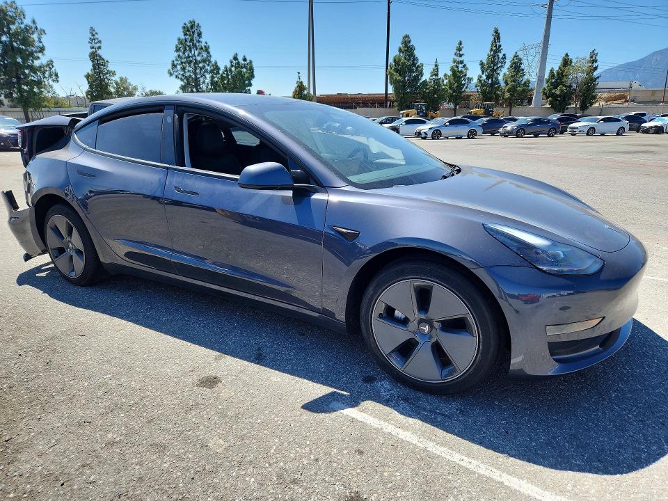 2023 Tesla Model 3 VIN 5YJ3E1EA2PF622262 COPART salvage auction — REAR END, Ca - Salvage Certificate, sold $4,950 on 2026-07-28 (photo 4)