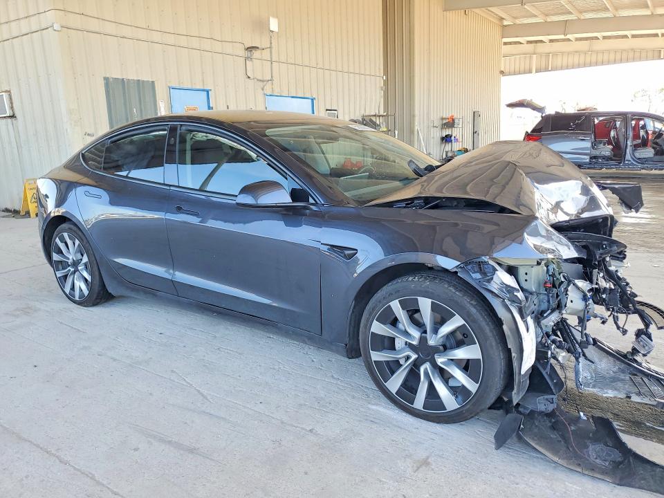 2025 Tesla Model 3 VIN 5YJ3E1EA4SF895034 COPART salvage auction — FRONT END, Fl - Cert Of Title Slvg Rebuildable, sold $7,400 on 2026-07-29 (photo 4)