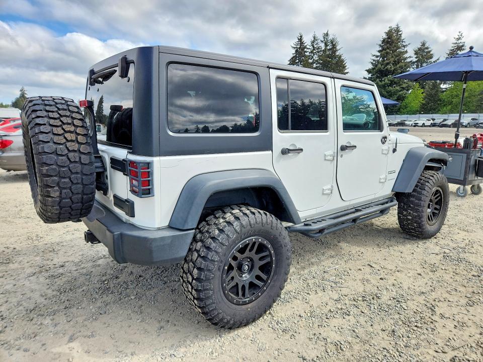 2014 Jeep VIN 1C4BJWDG5EL145797 COPART salvage auction — SIDE, Wa - Vehicle Cert Of Ownership-Titl, sold $7,100 on 2026-07-11 (photo 3)