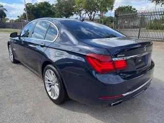2015 BMW 7er VIN WBAYB6C5XFD965910 COPART salvage auction — DAMAGE HISTORY, Fl - Cert Of Title Slvg Rebuildable (P), sold $6,700 on 2026-07-28 (photo 2)