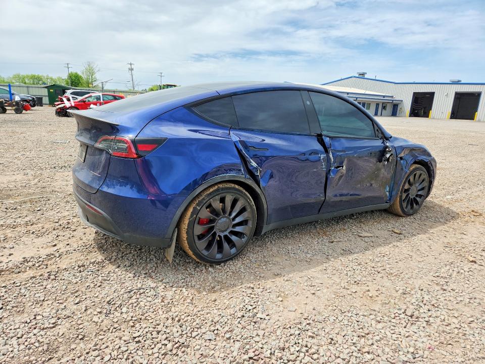 2023 Tesla Model y VIN 7SAYGDEF1PF856893 COPART salvage auction — SIDE, NY - MV-907A SALVAGE CERTIFICATE, sold $13,800 on 2026-07-06 (photo 3)
