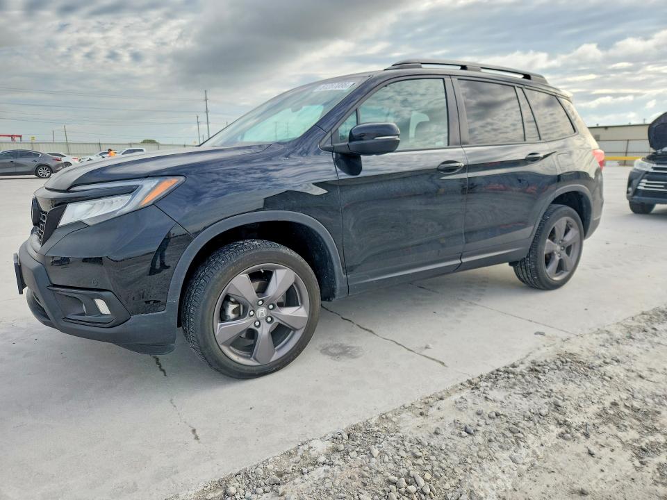 2021 Honda Passport VIN 5FNYF8H96MB040898 — COPART salvage auction photo