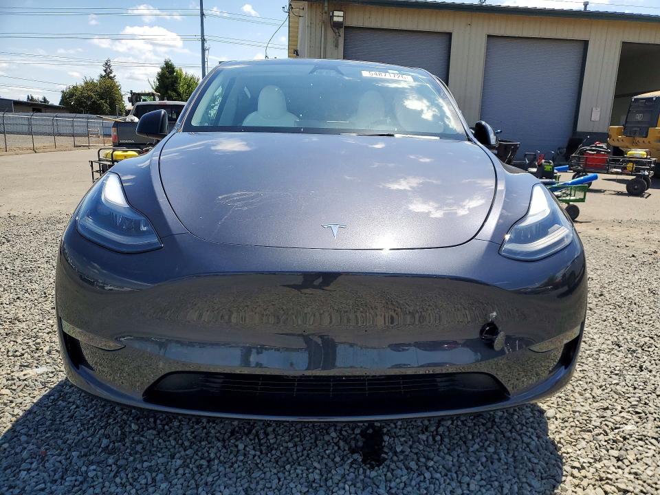 2024 Tesla Model y VIN 7SAYGDEE4RF074680 COPART salvage auction — SIDE, Or - Salvage Title Certificate, sold $14,600 on 2026-08-04 (photo 5)