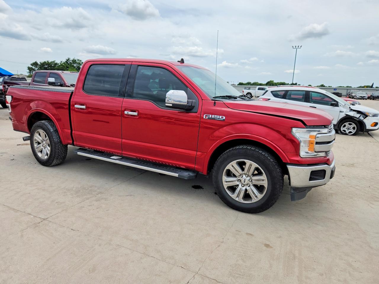 2020 Ford F-150 Lightning VIN 1FTEW1C48LKE36581 COPART salvage auction — Rear End, TX - SALVAGE VEHICLE TITLE, sold $10,400 on 2026-07-09 (photo 4)
