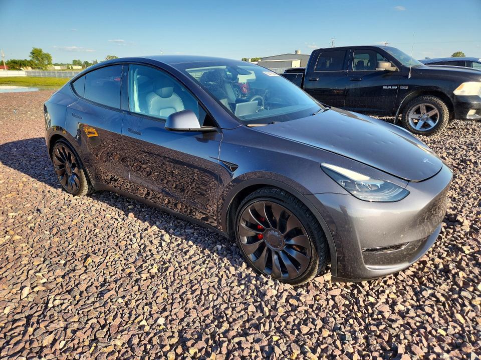 2022 Tesla Model y VIN 7SAYGDEF5NF549207 COPART salvage auction — HAIL, Mo - Certificate Of Title, sold $16,600 on 2026-07-22 (photo 4)