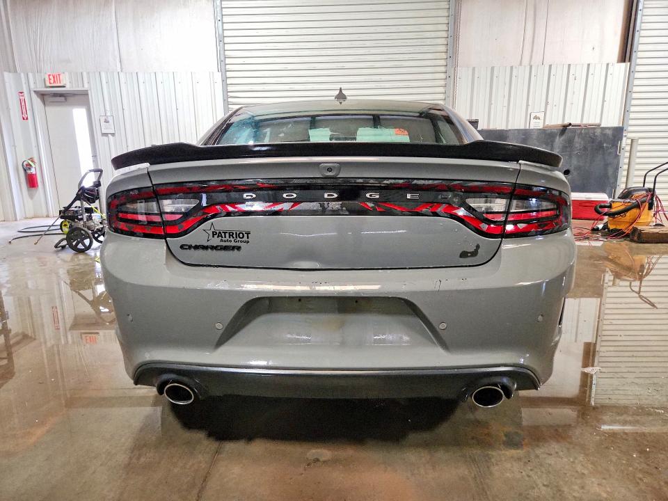 2023 Dodge Charger VIN 2C3CDXGJ0PH672241 COPART salvage auction — SIDE, Ok - Cert Of Title-Repossession, sold $30,000 on 2026-07-30 (photo 6)