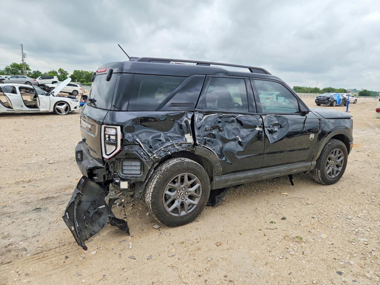 2025 Ford Bronco Sport VIN 3FMCR9BN9SRF76362 COPART salvage auction — Side, TX - SALVAGE VEHICLE TITLE, sold $5,100 on 2026-07-09 (photo 3)