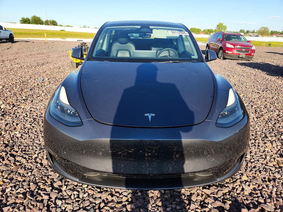 2022 Tesla Model y VIN 7SAYGDEF5NF549207 COPART salvage auction — HAIL, Mo - Certificate Of Title, sold $16,600 on 2026-07-22 (photo 5)