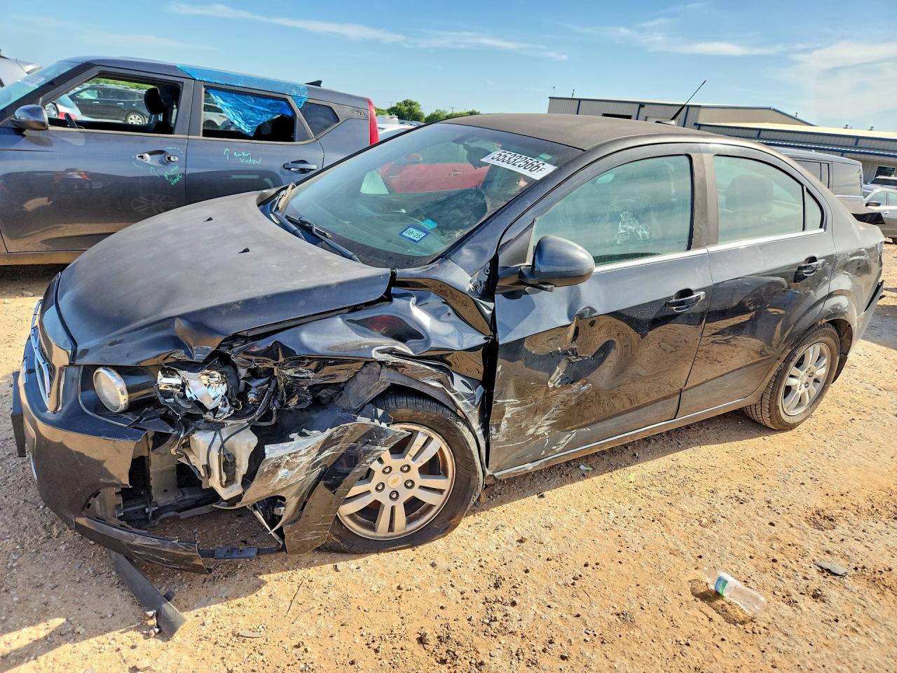 2014 Chevrolet Sonic VIN 1G1JC5SG0E4129125 COPART salvage auction — Front End, TX - SALVAGE VEHICLE TITLE, sold $325 on 2026-06-25 (photo 1)