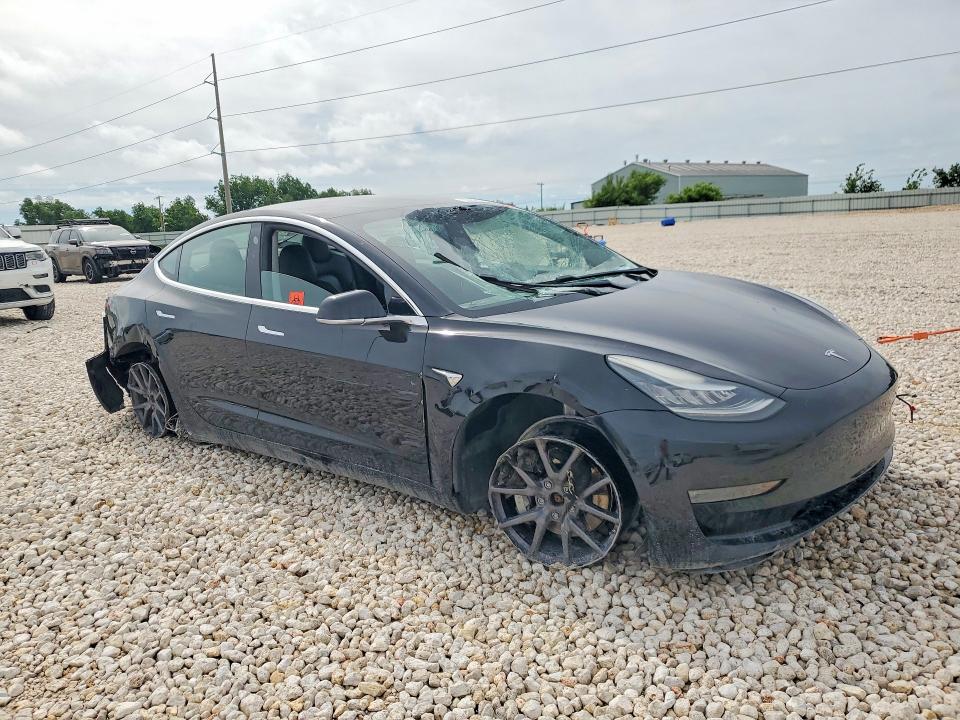 2019 Tesla Model 3 VIN 5YJ3E1EB2KF384205 COPART salvage auction — SIDE, Tx - Salvage Vehicle Title, sold $3,400 on 2026-07-09 (photo 4)