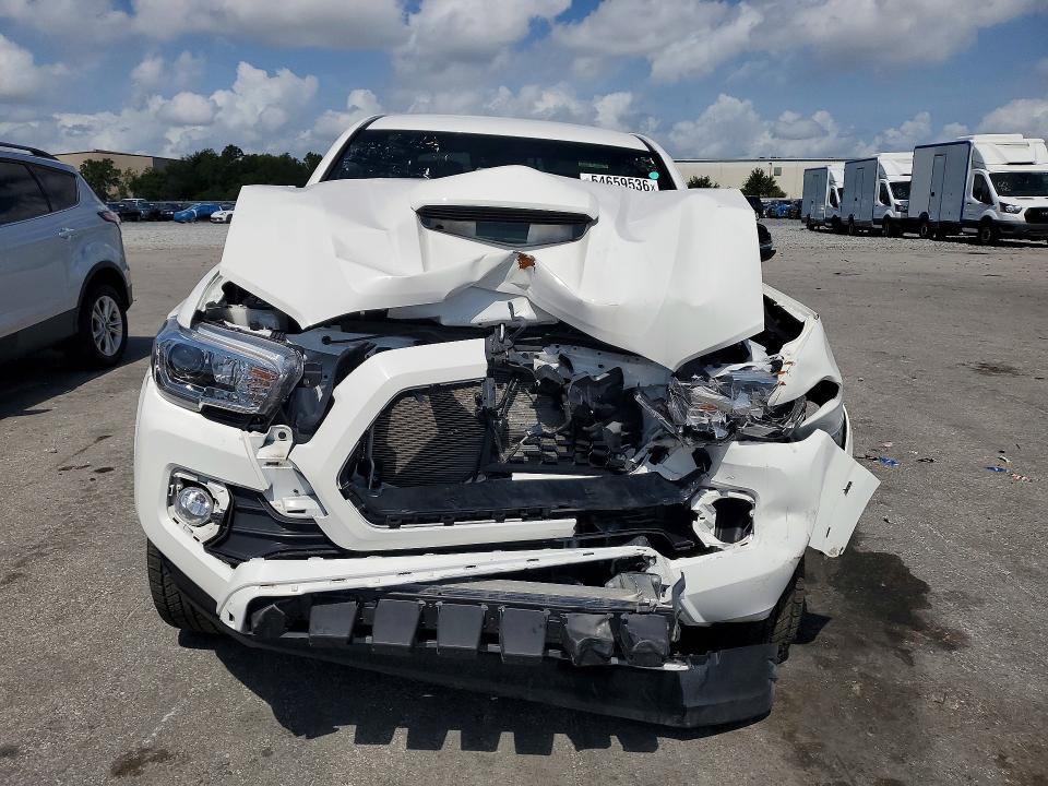 2023 Toyota Tacoma VIN 3TMAZ5CNXPM207940 COPART salvage auction — FRONT END, FL - CERTIFICATE OF TITLE (P), sold $16,000 on 2026-07-31 (photo 5)