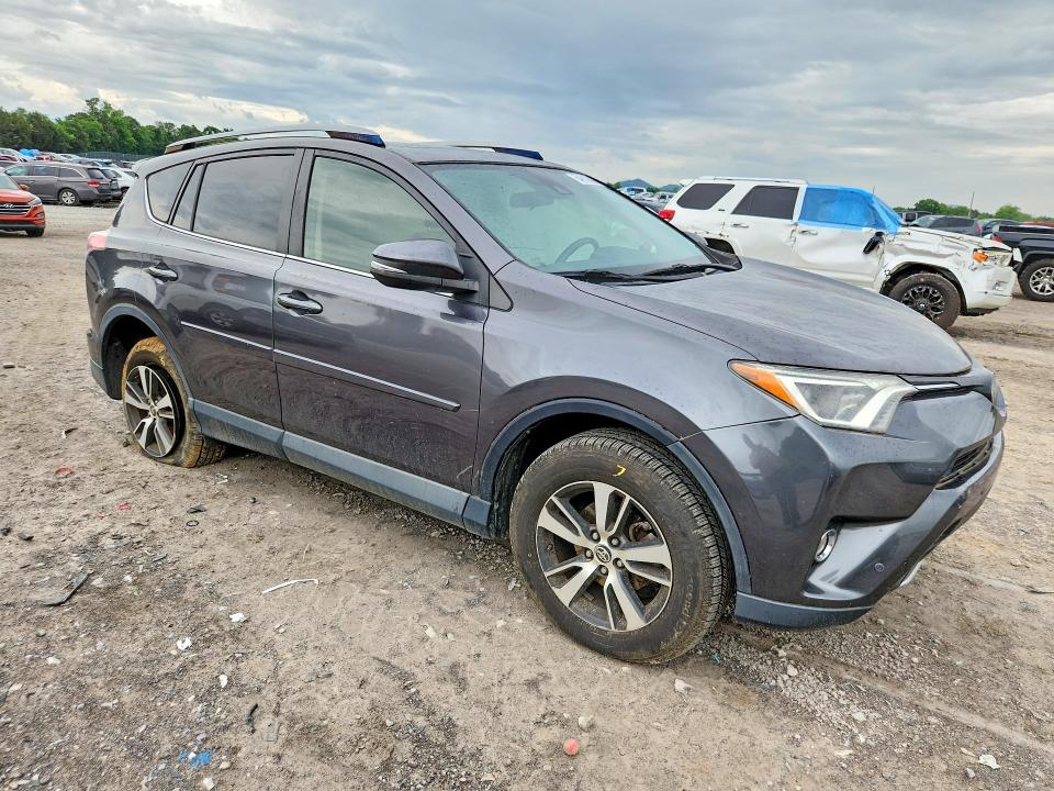2017 Toyota VIN JTMRFREV2HJ704477 COPART salvage auction — SIDE, Tn - Salvage Certificate, sold $5,500 on 2026-07-02 (photo 4)