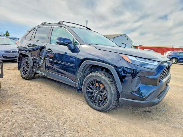 2023 Toyota Rav4 hybrid VIN 2T3RWRFV9PW158954 COPART salvage auction — SIDE, On - Permit No Brand - Unfit, sold $17,400 on 2026-07-02 (photo 4)