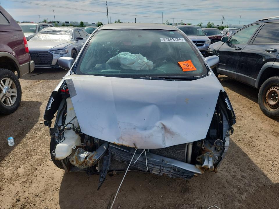 2009 Honda Fit VIN JHMGE87409S053515 COPART salvage auction — FRONT END, IL - JUNKING CERT OF A VEHICLE, sold $275 on 2026-07-21 (photo 5)