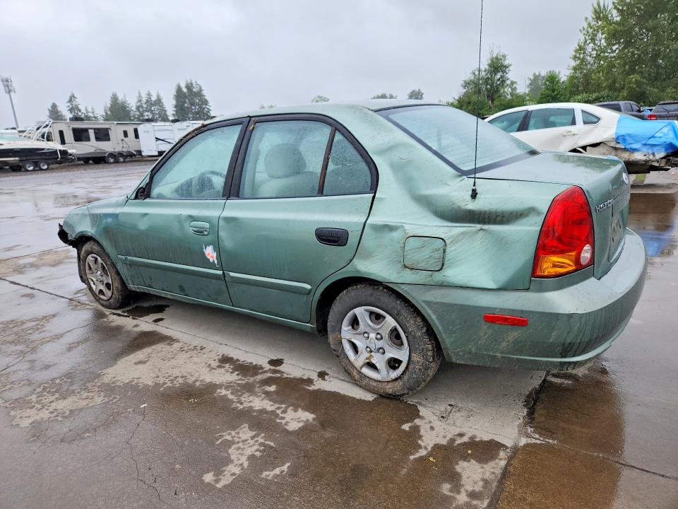 2005 Hyundai Accent VIN KMHCG45C35U585400 COPART salvage auction — ROLLOVER, Or - Salvage Title Certificate, sold $150 on 2026-07-27 (photo 2)
