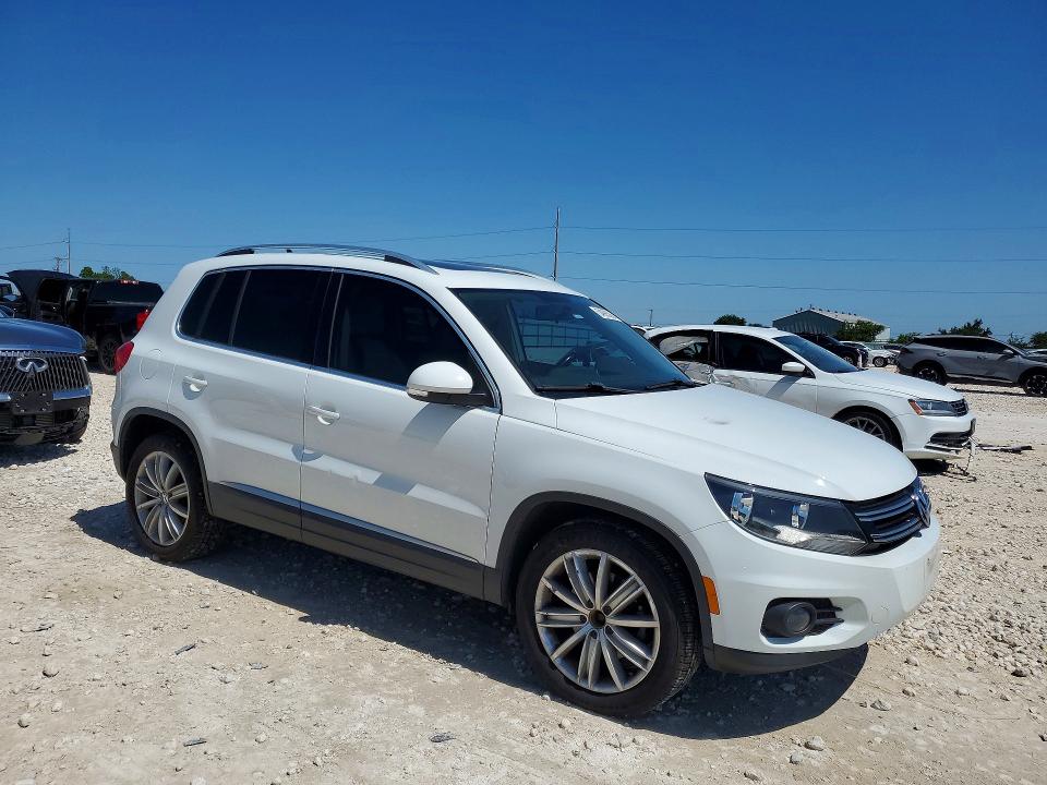 2015 Volkswagen Tiguan VIN WVGAV7AX8FW604603 COPART salvage auction — NORMAL WEAR, Tx - Salvage Vehicle Title, sold $150 on 2026-08-13 (photo 4)