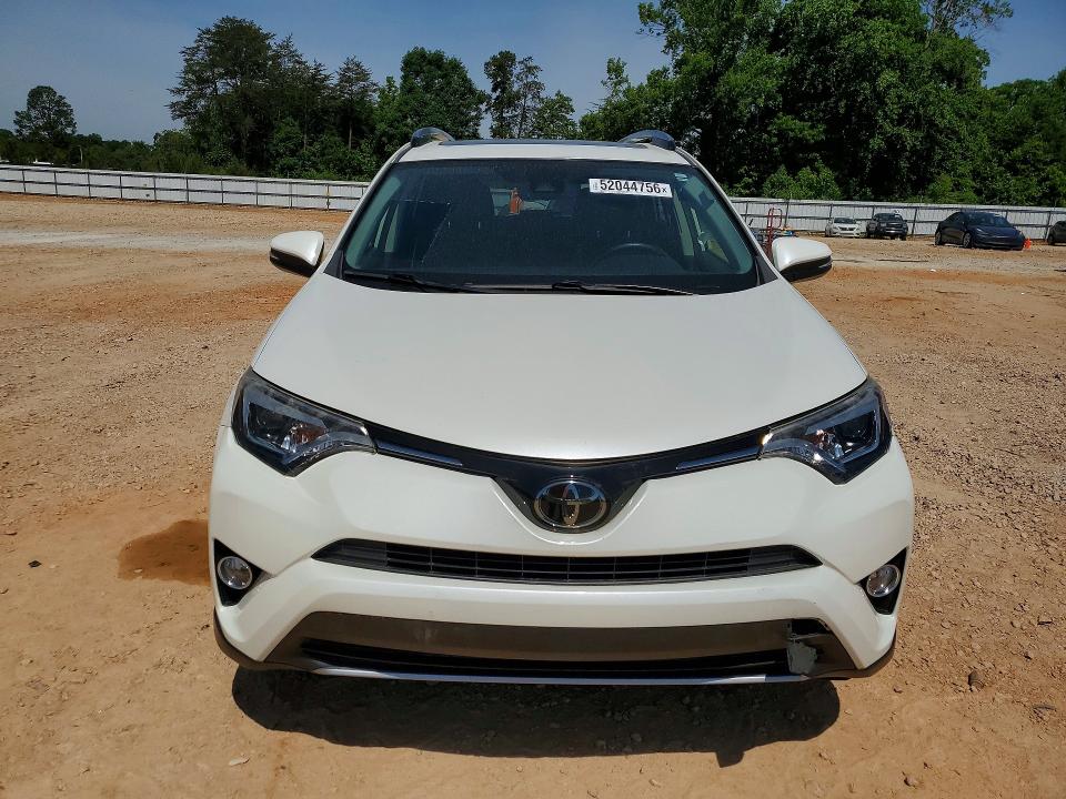 2018 Toyota Rav 4 VIN JTMYFREV8JJ171150 COPART salvage auction — SIDE, Nc - Salvage Certificate Of Title, sold $5,700 on 2026-07-27 (photo 5)