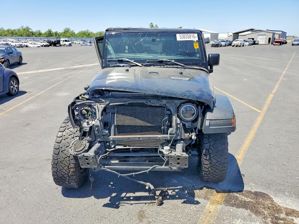 2014 Jeep VIN 1C4HJWDG4EL250096 COPART salvage auction — SIDE, CA - SALVAGE CERTIFICATE, sold $3,150 on 2026-07-02 (photo 5)