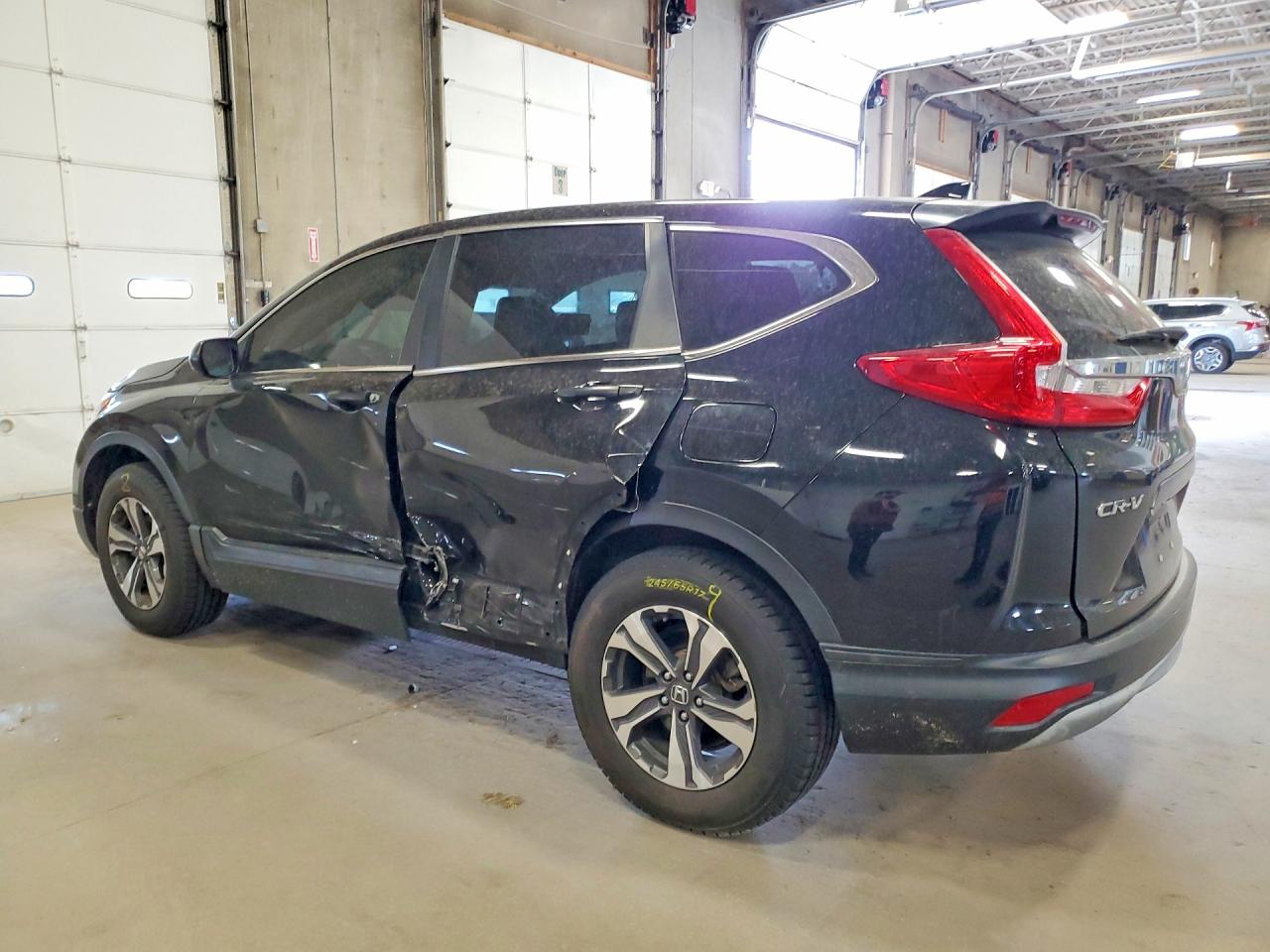 2017 Honda CR-V VIN 2HKRW6H37HH210584 COPART salvage auction — Side, MN - CERT OF TITLE-SALVAGE, sold $5,700 on 2026-07-07 (photo 2)